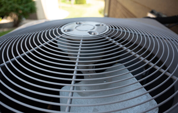 Top view of Residential air conditioning unit outdoors with fan and coils